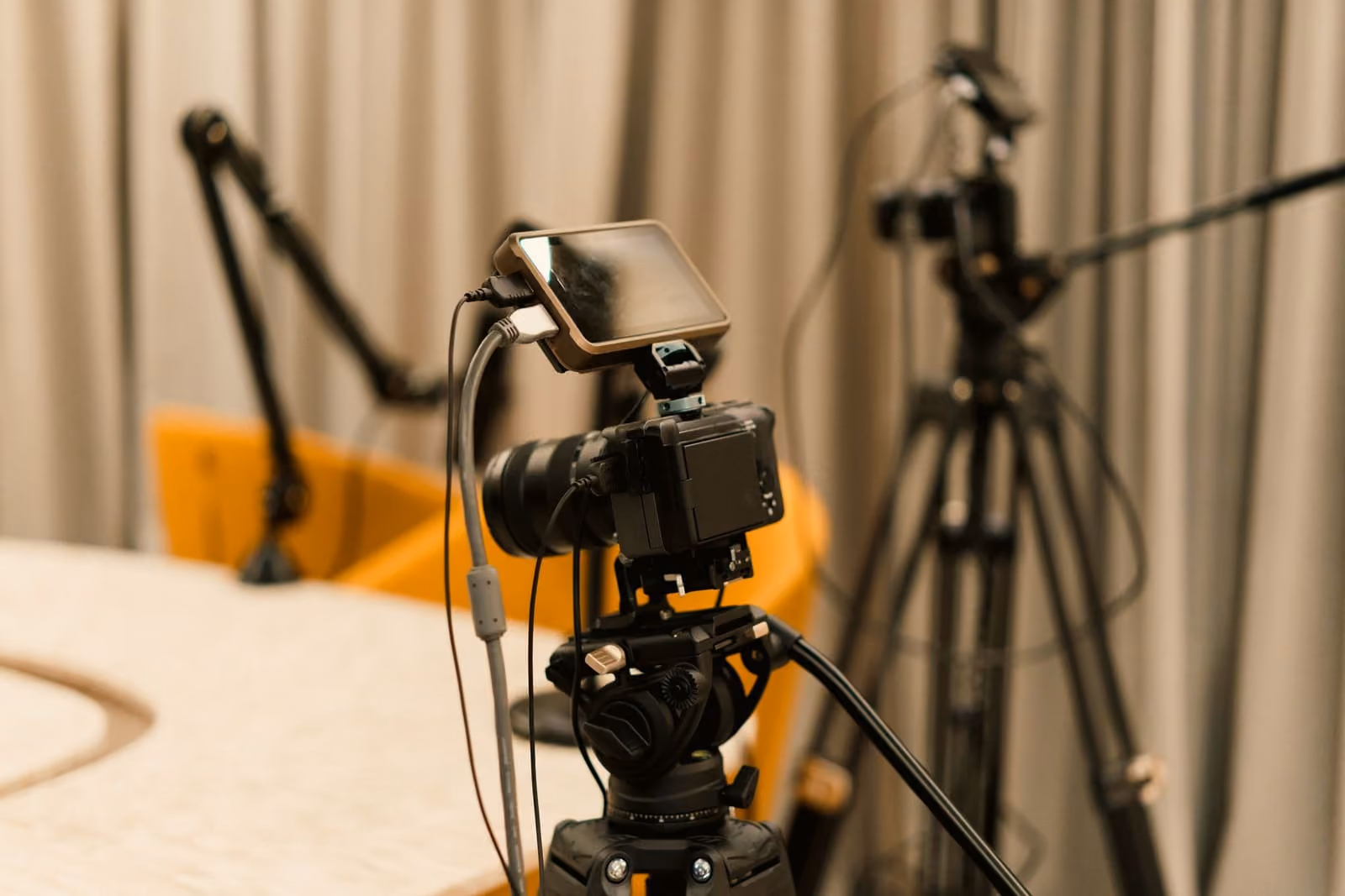 A studio set up with cameras and microphones for a live stream